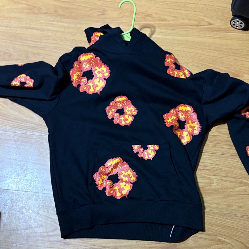 Black offset demin tear with Red and Yellow Floral Design